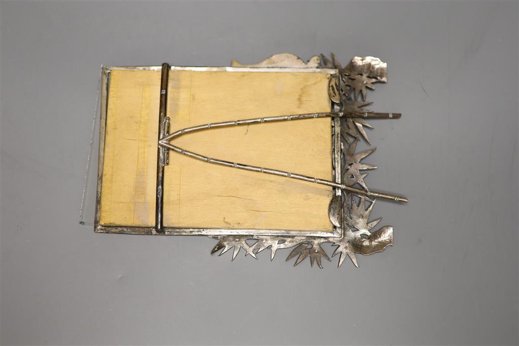 An early 20th century Chinese white metal photograph frame. by Wang Hing, 18.2cm.